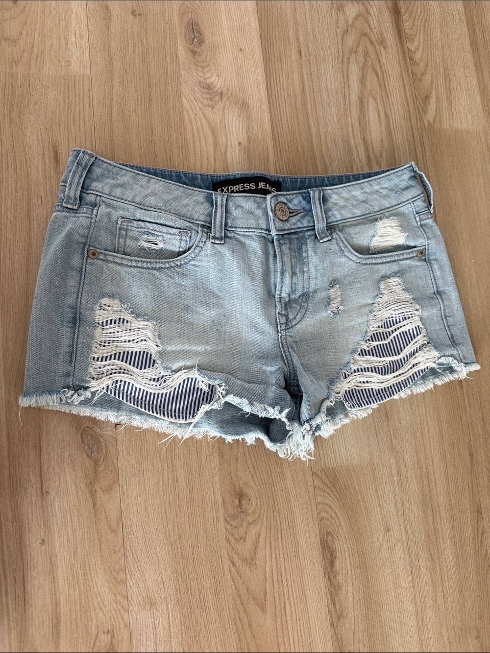 Express Light Blue Distressed Denim Shorts with Striped Underlay